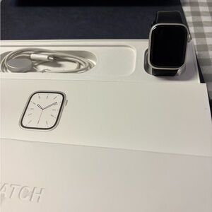 Apple Smartwatch with Black Band and Silver Frame